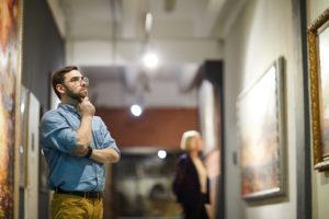 A man admiring the art at the Missoula Art Museum