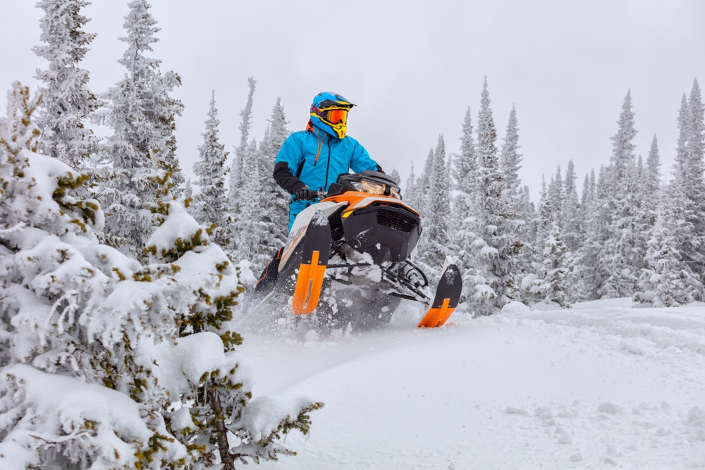 Man enjoying some of the best snowmobiling in Montana near our Missoula Bed and Breakfast