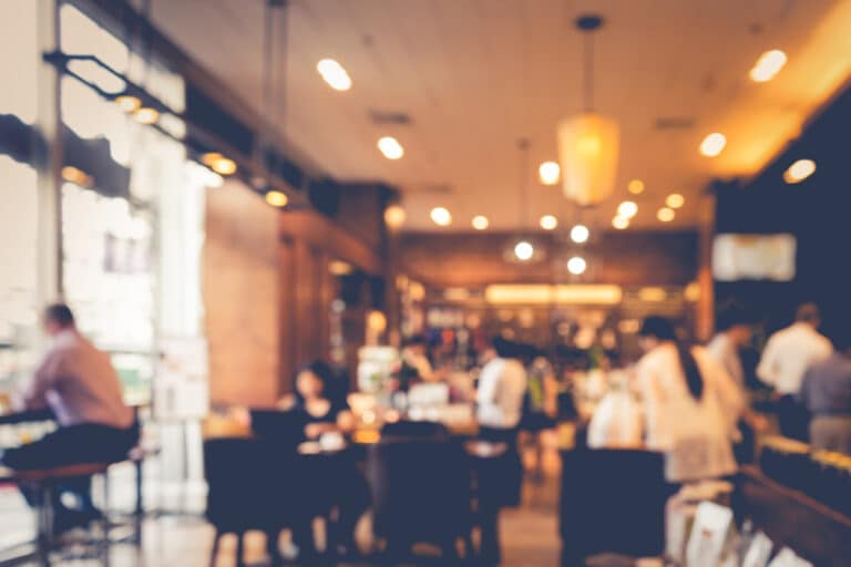 blurred photo of people eating at Missoula restaurants