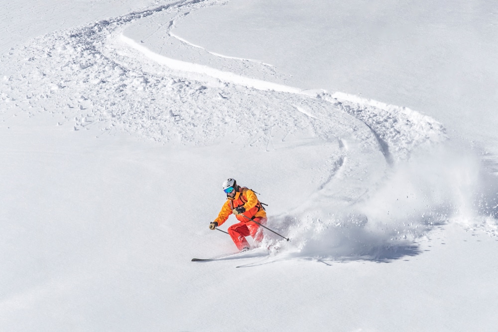 Skiier enjoying downhill skiing near Missoula