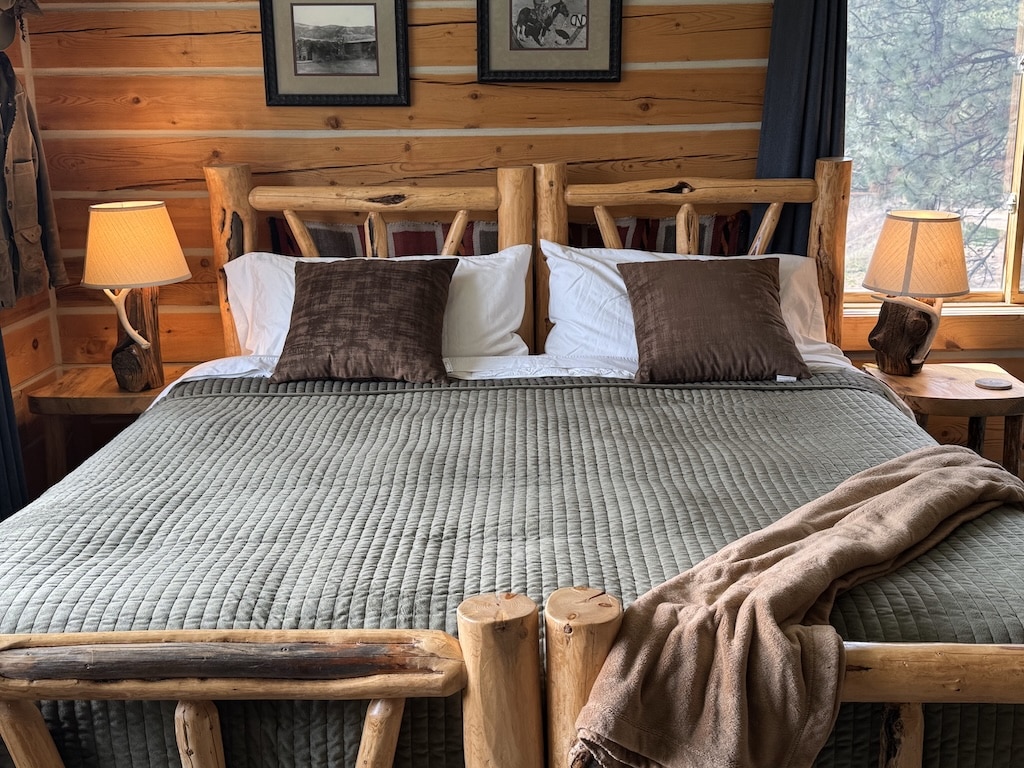 Enjoy the Best Places to Eat in Missoula 8 Check out lodging near Missoula, wooden bed frame with green comforter and white and brown pillows